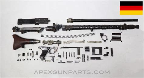 WW2 German MG 34 parts kit with torch cut receiver, wooden stock, original issue barrel, some ...