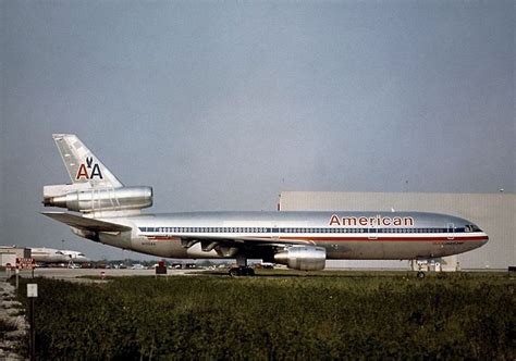 an american airlines airplane is parked on the runway