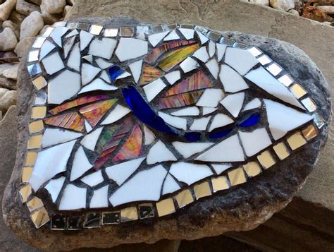 A simple rock with a mosaic of broken glass...fills my garden with charm. Stone Mosaic Tile ...