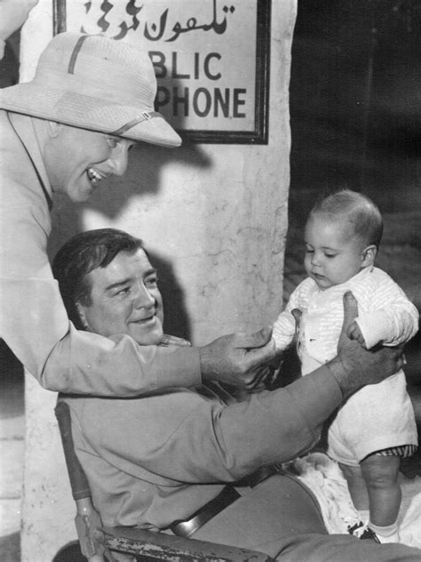 Lou Costello showing off his first grandchild on the set of "Abbott ...