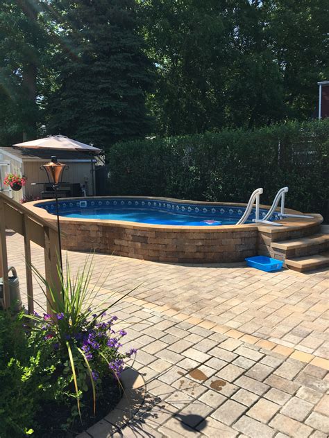 Radiant 14x22 Semi-Inground Freeform with Pavers | Backyard pool ...