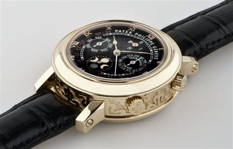 Spot the Watch: Escape Plan and a Patek Philippe Sky Moon Tourbillon