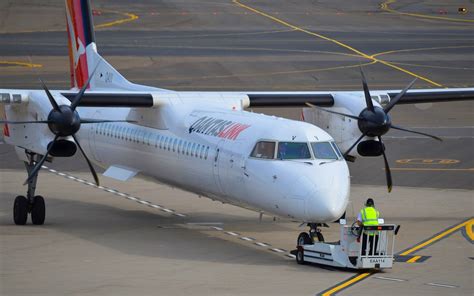 Qantas Bombardier Dash 8 Q400 At Sydney Airport by lonewolf6738