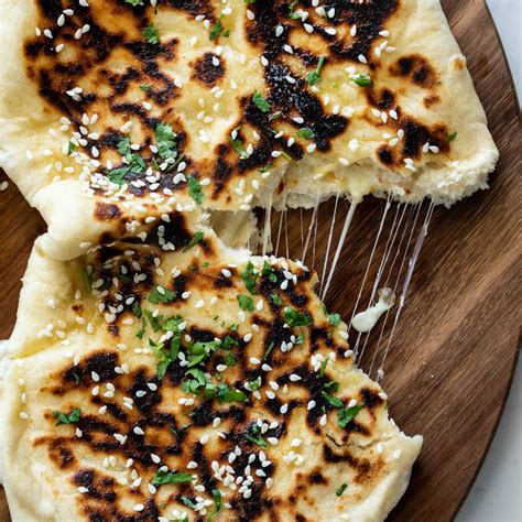 Cheese-Stuffed Garlic Naan - Simply Delicious