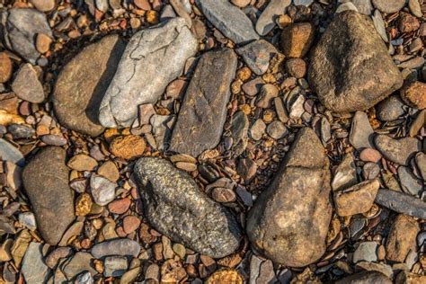 Riverbed rocks and stones stock image. Image of background - 191930377