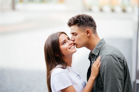 What Does It Mean When A Guy Kisses Your Cheek? | Body Language Central