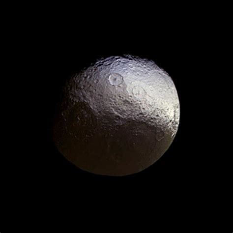 Saturn's two-faced moon Iapetus | Today's Image | EarthSky