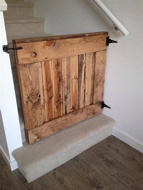 a wooden headboard sitting on the side of a wall next to a stair case