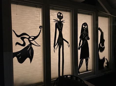 I made some Halloween window silhouettes after being inspired by a post ...