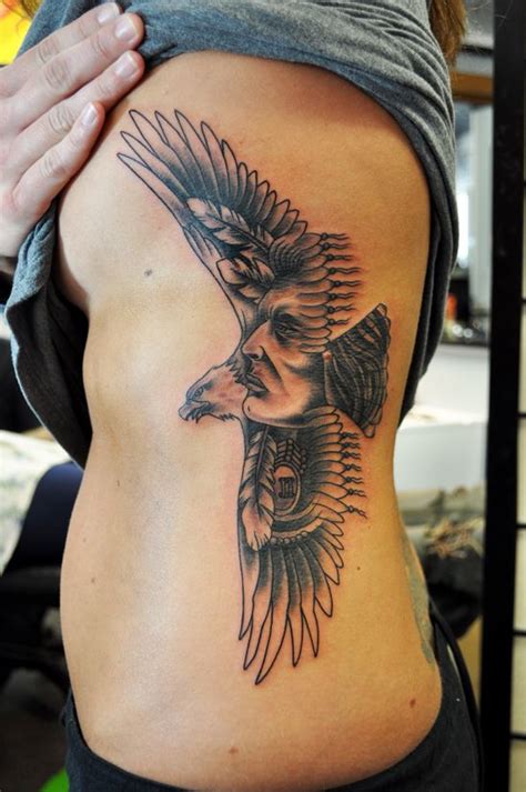 american eagle tattoos for women | Tattoo of an eagle and Indian Face on a rib cage . | Eagle ...