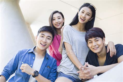 Chinese friends posing and looking in camera — Men, smiling - Stock ...