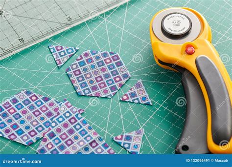 The Process of Cutting Pieces of Fabric in the Shape of Hexagons To Create a Quilt Stock Image ...