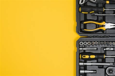 Premium Photo | Box with set of tools for car repair, closeup