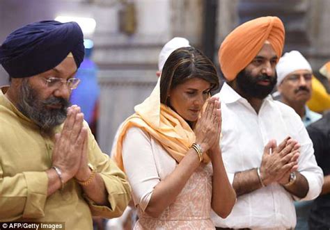 UN Ambassador Nikki Haley prays at a Sikh temple as she continues her ...