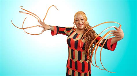 This Woman Is the Guinness World Record Holder for the Longest Nails | Allure