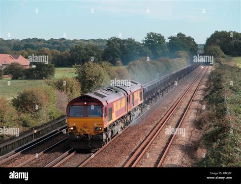 A pair of EWS class 66 locomotives working a train of empty steel Stock Photo - Alamy