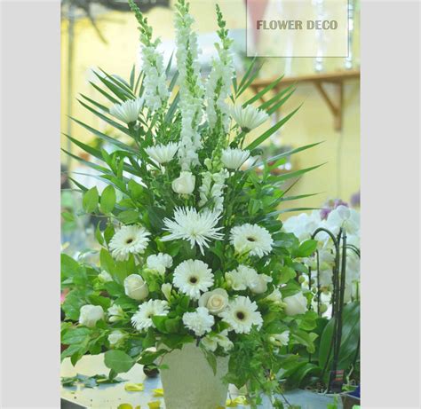 All White Funeral Arrangement – Flower Deco