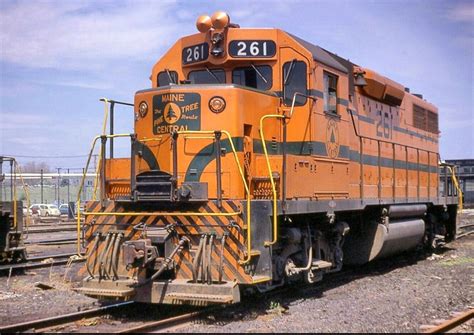 Orange Train Engine on the Tracks