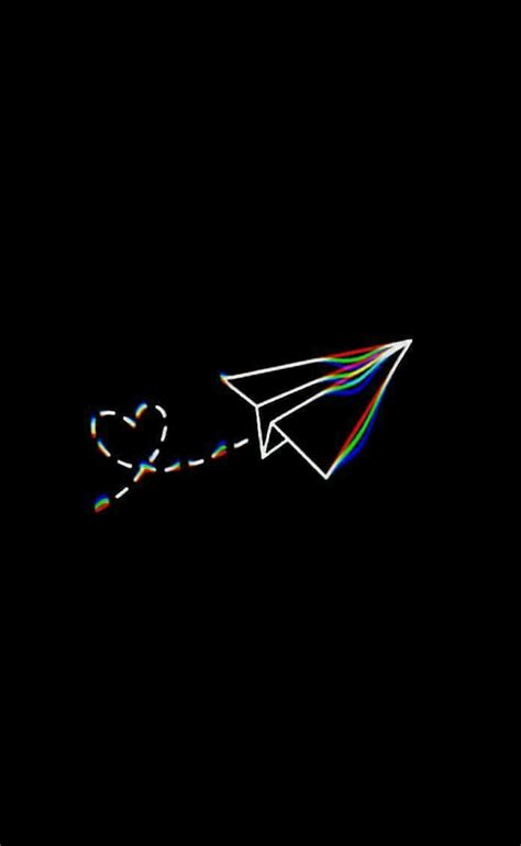 Download A Paper Airplane With A Rainbow String Wallpaper | Wallpapers.com