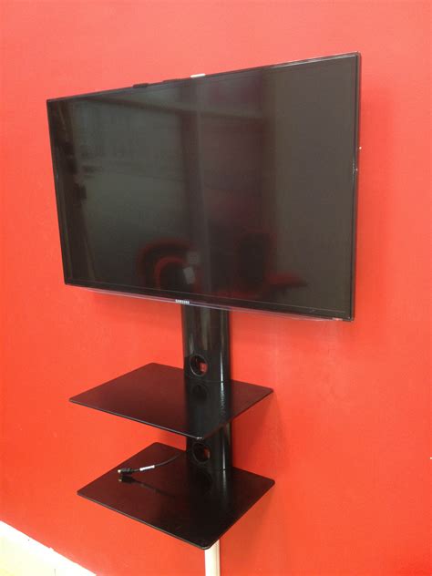 Smart TV Wall Mounted With Shelf Unit