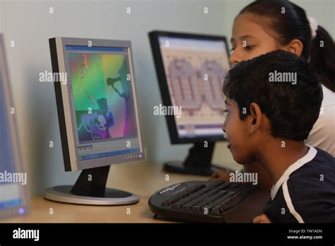 Students using computer in a classroom Stock Photo - Alamy