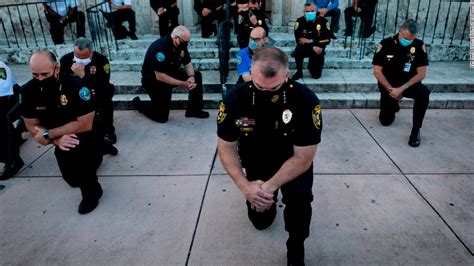 In New York and Coral Gables, police take a knee in solidarity with protesters - CNN Video