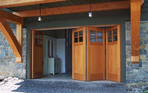 Folding doors allow wide access to boats and more for the lake house ...