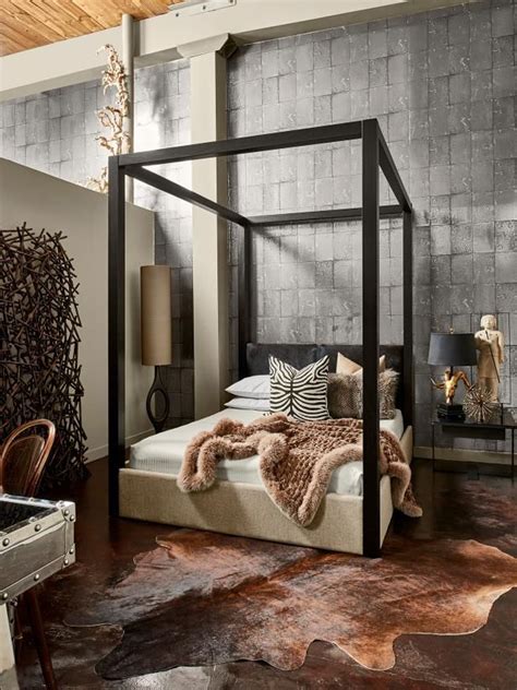 Animal skin rugs, fur throws, a zebra print pillow...this loft bedroom has a wild side. Check ...