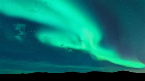 Night landscape with aurora borealis, Lofoten islands, Norway | Windows Spotlight Images