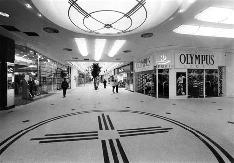 Recognise these old Cascades shops? Unseen photos show shopping centre's construction and life ...