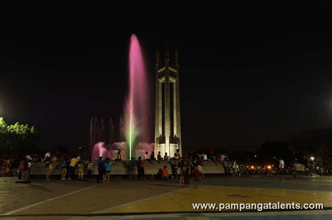 Fountain inside Quezon Memorial Circle at night.