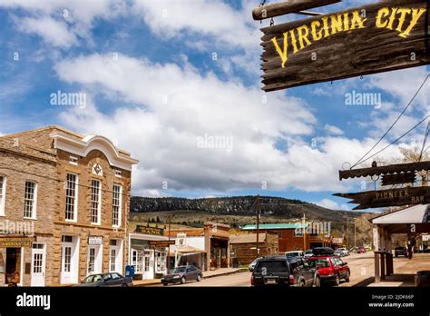 Ghost town at Virginia City is now a tourist attraction in Montana. Deserted log cabins, train ...