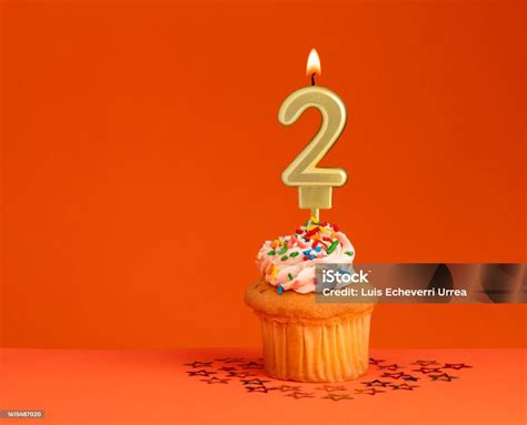 Number 2 Candle Birthday Card Design In Orange Background Stock Photo - Download Image Now - iStock