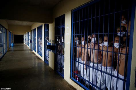 Inside El Salvador's hell hole jails: Heavily-tattooed gangsters are packed into overcrowded ...