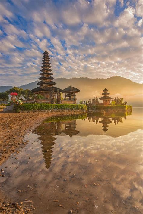 A Reflection of a Pura Temple at Sunrise - Pura Ulun Danu Bratan Stock Photo - Image of ...