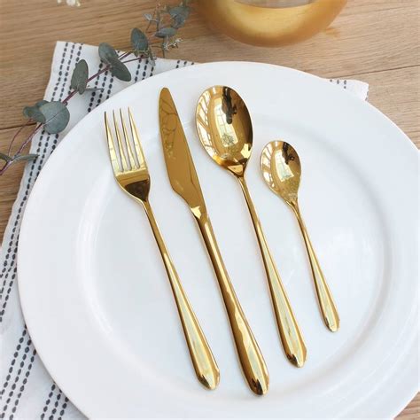 gold cutlery set by marquis & dawe | notonthehighstreet.com