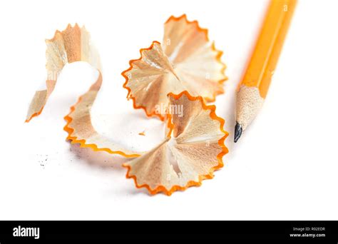 Pencil shavings over white background Stock Photo - Alamy