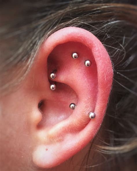 Snug Piercing [50 Ideas]: Pain Level, Healing Time, Cost, Experience - Piercee