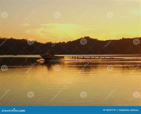 Sunset Boat Ride on Lake stock image. Image of ride, boat - 42657791