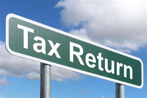 Tax Return - Free of Charge Creative Commons Green Highway sign image