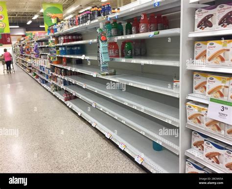 Empty grocery store shelves Stock Photo - Alamy