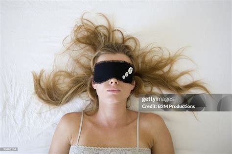 Woman Sleeping With Eye Mask High-Res Stock Photo - Getty Images