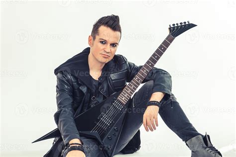 Portrait of heavy metal musician with electric guitar. 11626941 Stock ...