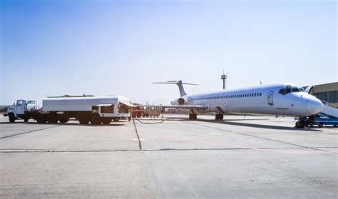 Aircraft Refueling with a High Pressure Tanker. a Passenger Jet is ...