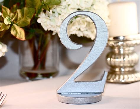 metallic silver wedding reception table numbers | OneWed.com