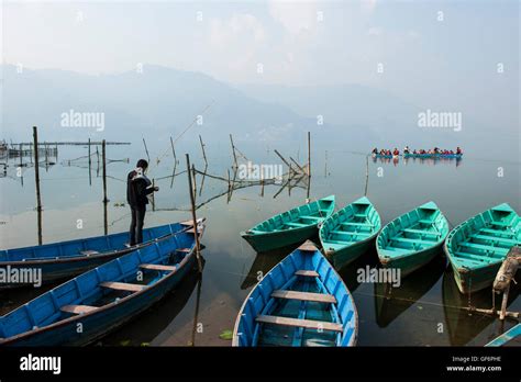 Nepal, Pokhara, local lake, boats Stock Photo - Alamy