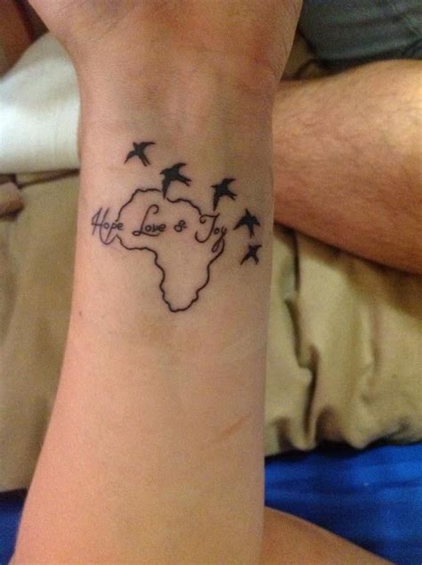 Hope Love Joy Africa Tattoo | African tattoo, Africa tattoos, Tattoos for guys