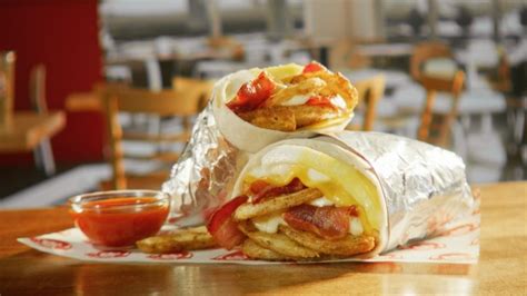 Wendy's New Breakfast Burrito Doesn't Shy Away From The Bacon