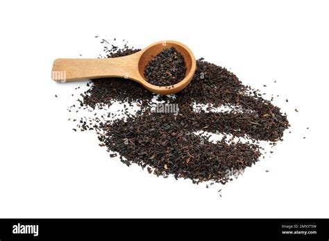 Dry black tea leaves isolated on white background Stock Photo - Alamy