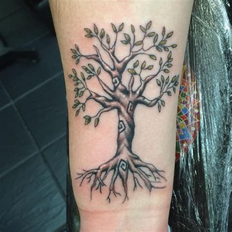 Mystical big colored lonely tree tattoo on wrist - Tattooimages.biz